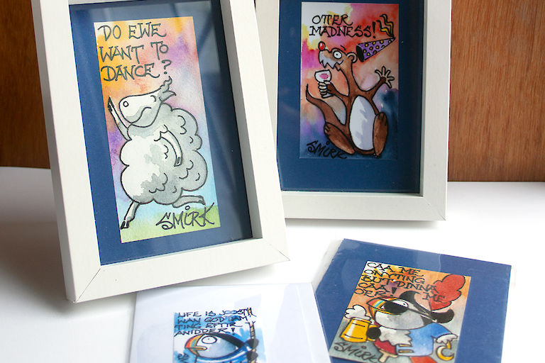 Cartoon Prints, Blue (SG003) £5.00 and White (SG004) £2.50 each, Framed A5 Cartoon Prints (SG005) £10 each